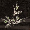 Embroidered design of a cat on a black fabric background